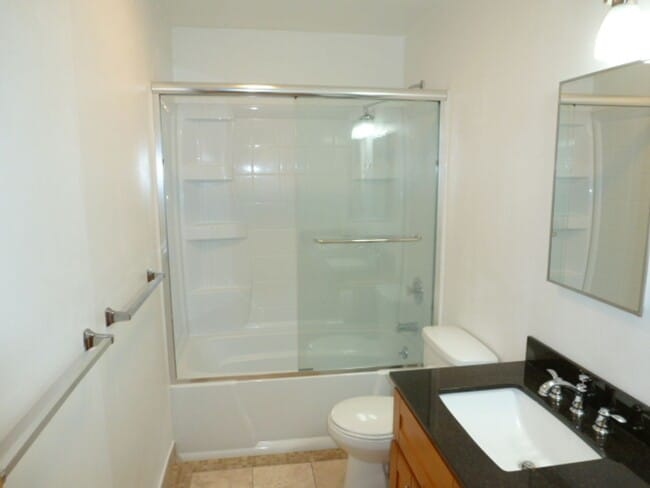 Building Photo - Four Bedroom, Two Bath, Two Car Garage Rem...
