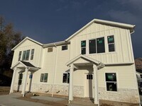 Building Photo - Half off first months rent - Beautiful townhome with 2 car garage, Central Air and Master Suite
