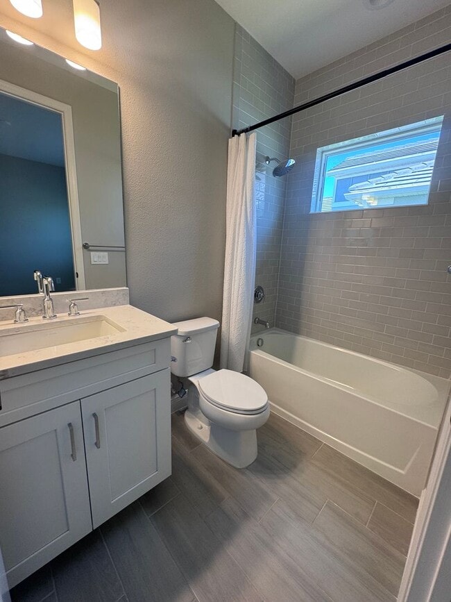 Building Photo - New Construction in Grand Park-4 Bedrooms and 4 Bathrooms with a Den and a Loft! No deposit for q...