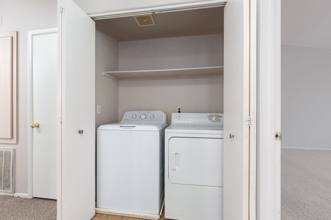 Building Photo - Two bedroom with two car garage in gated c...