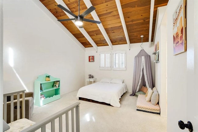 Building Photo - Spacious 1,550 Sq Ft Townhome | 2-Car Garage & High Ceilings w/ Exposed Beams