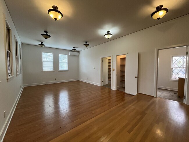 Building Photo - Expansive 4BR 2,900+ Sq Ft Home with Theater-Style Living Room & Bonus Hobby Workshop