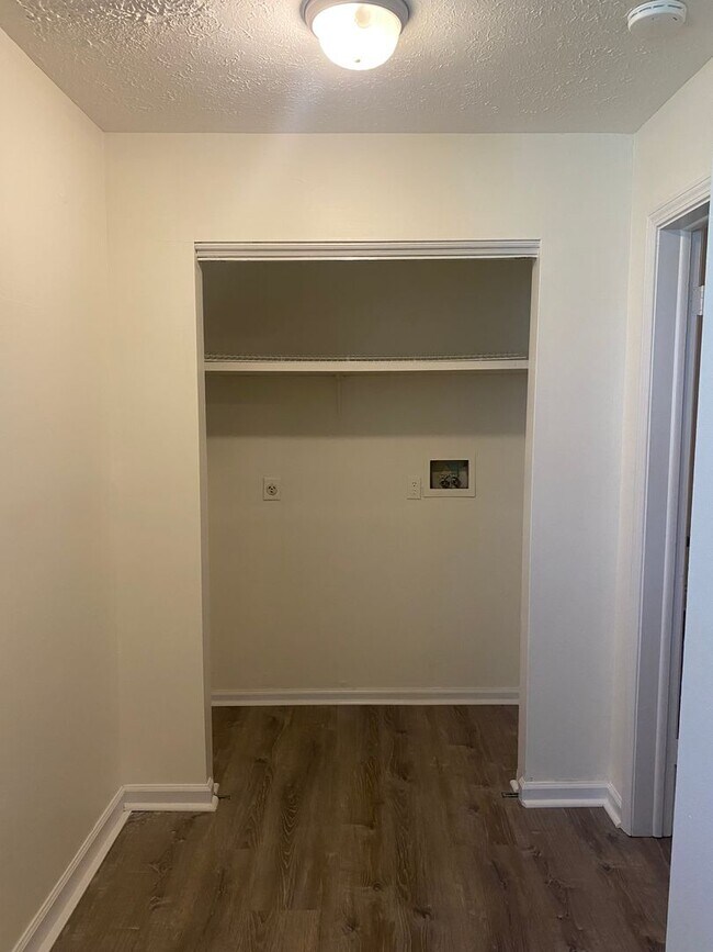 Building Photo - Updated three bedroom two bathroom home in...