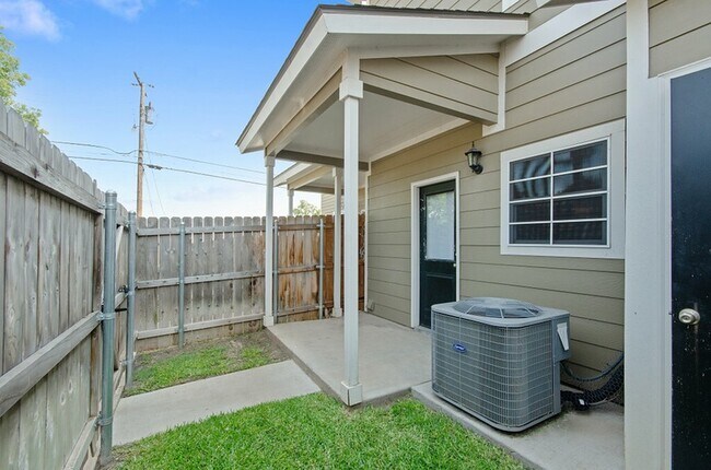 fenced and shaded entrance to unit - Tinsley Place