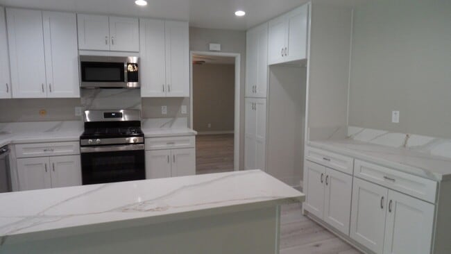 Building Photo - Beautiful Remodeled Single Story 4 BR 2 BA Home With 3 Car attached Garage