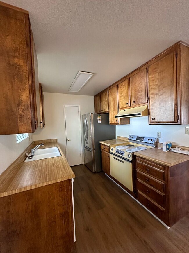 Building Photo - Al Tahoe 3 Bedroom Home with Garage, Just ...