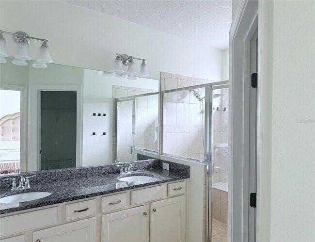 Building Photo - 7112 Enchanted Lake Dr