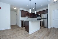 Building Photo - Luxury Living with Extra Space – 1 Bed + D...