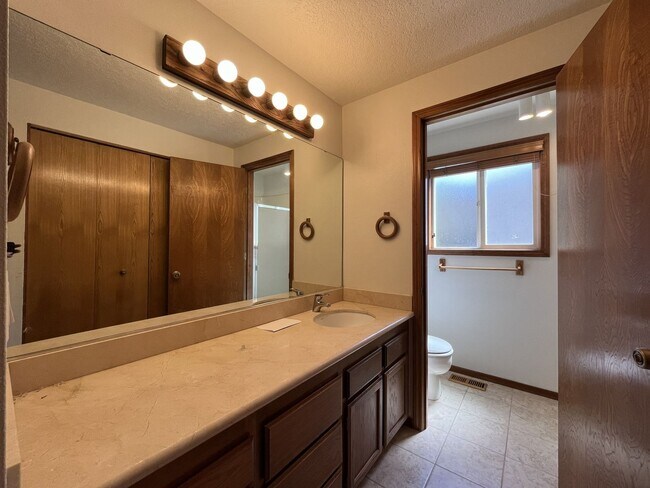 Building Photo - Charming Single-Level Home with Multiple Living Areas and Spacious Backyard Retreat