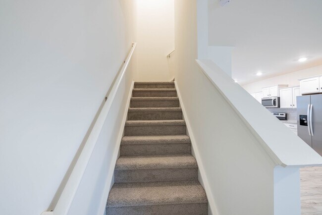 Building Photo - Charming 3-Bedroom End Unit Townhome Near Jack Alexander Blvd - MOVE IN SPECIAL