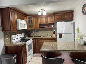 Building Photo - 4275 NW S Tamiami Canal Dr
