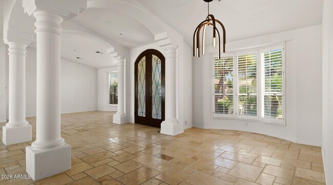 Building Photo - 8638 E Dahlia Dr