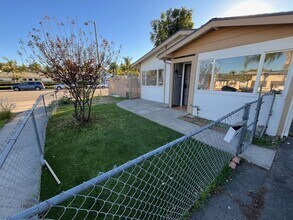 Building Photo - Fully Renovated Home with Large Extra Livingroom and Large Backyar