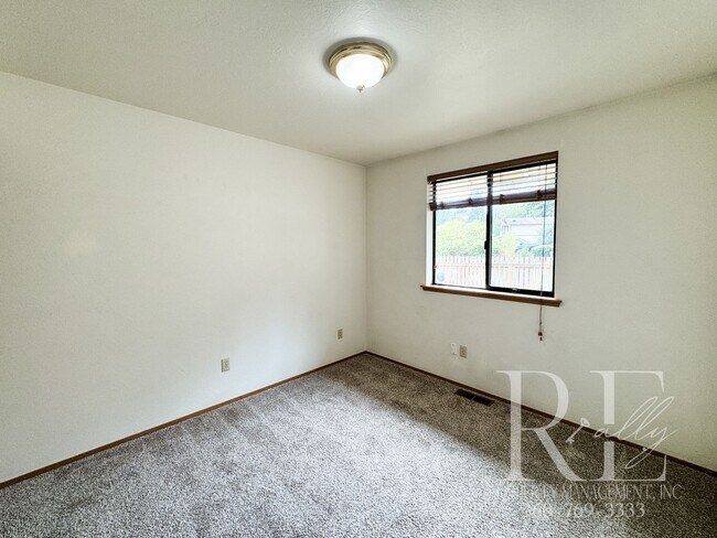 Building Photo - Your Charming Rustic Retreat- 3 Bedroom With Wrap-A-Round Yard