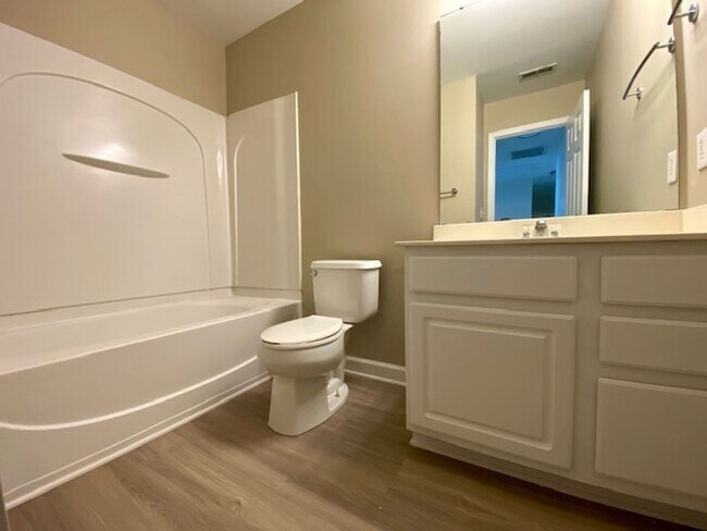 Building Photo - 1/2 MONTH FREE! ?Upgraded 4BR with Brand New Flooring & Private Backyard – Available Feb 15