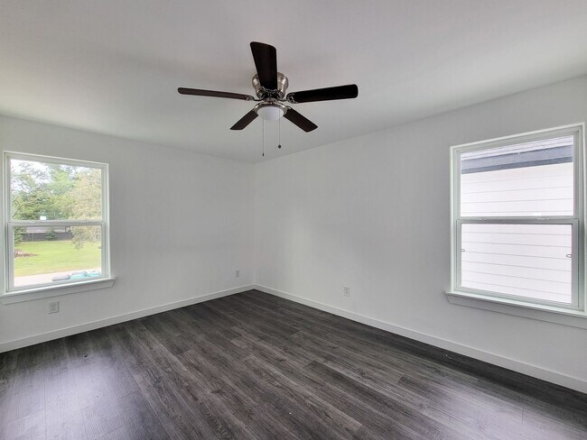 Building Photo - This newly constructed 3-bedroom, 2-bathroom unit offers modern living with 1,150 sq ft of space....