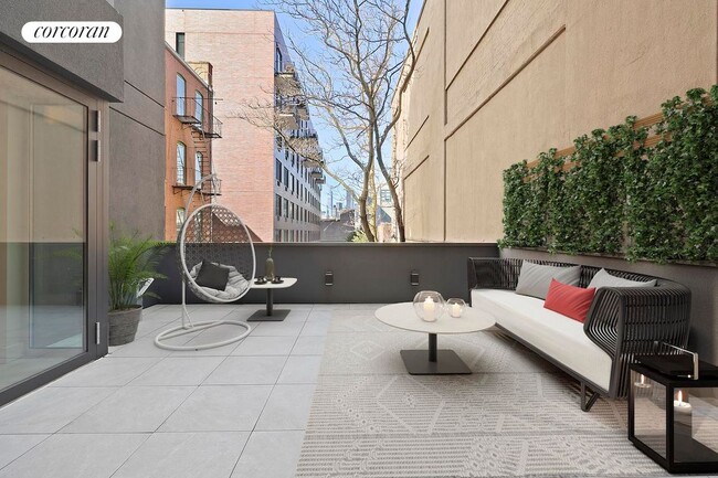 Building Photo - 21-59 44th Drive 2C