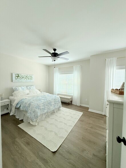 Bedroom 2 shown fully furnished—see how easily the space transforms into a comfortable retreat - 205 Cherry Way