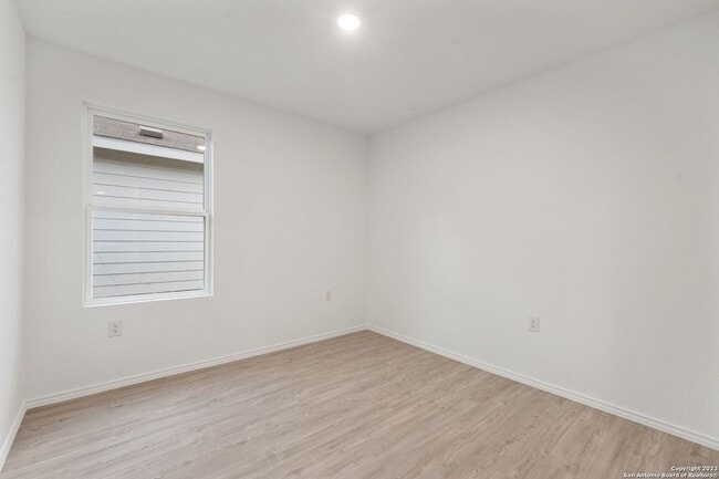 Building Photo - This beautiful single-story home has 4 bedrooms, 2 baths, vinyl flooring throughout, an open floo...