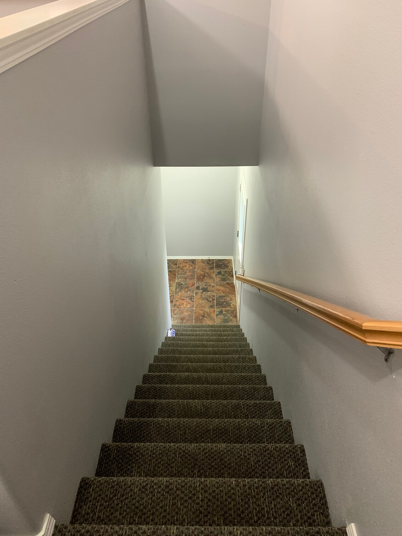 Stairs to garage and gated patio - 1661 NE Market Dr