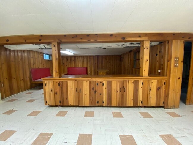 Building Photo - Welcome to this charming three-bedroom, tw...