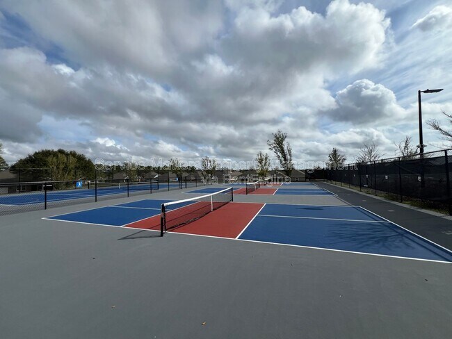 Building Photo - 4130 Lazy Breeze Ln