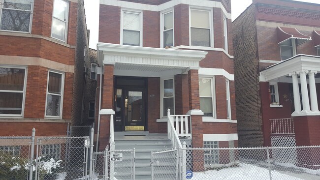 Building Photo - 7309 S Langley Ave