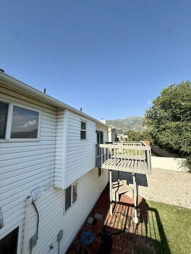 Building Photo - Spacious Comfort Meets Practical Living in...