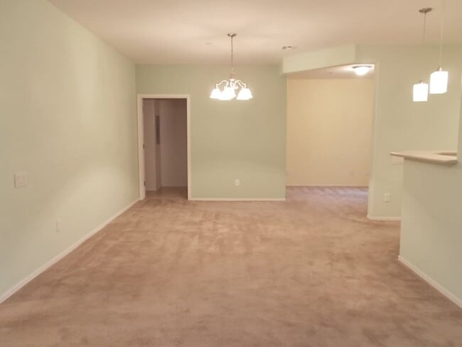 Building Photo - Spacious 2 Bedroom + Den, 2 Bath Condo in a Gated Community