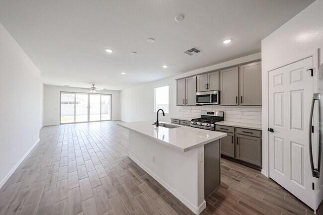Building Photo - Modern Mountainside Living: Stunning New 4-Bedroom Home in Estrella Crossing! 3 CAR GARAGE!