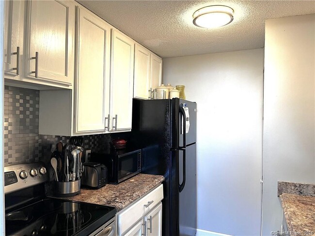 Building Photo - 83 Cinnamon Spring