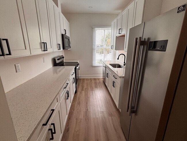Building Photo - Renovated 4BR Just Minutes from Flagler! Historic Downtown Living! Lawn Care Included! ((Recently...