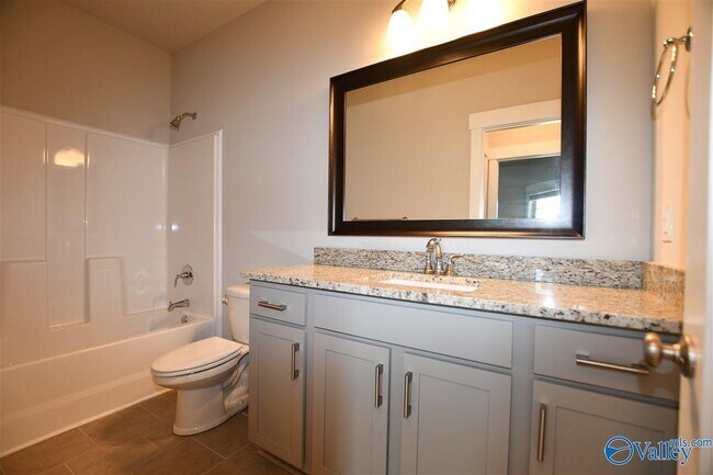 Building Photo - 702 Sluice Dr SW