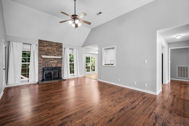 Building Photo - Stunning Stone Fireplace • Finished Basement • Fenced Yard