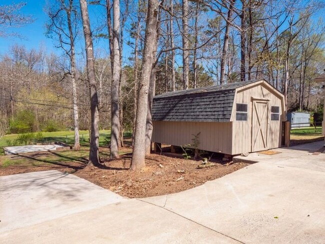 Building Photo - Spacious 4-Bedroom Mint Hill Retreat with Fireplace, 2-Car Garage & 3,600+ Sq Ft