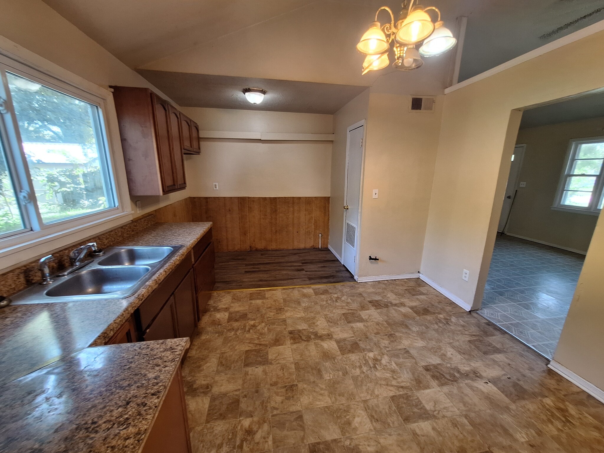 Kitchen and dining area - 7005 John Adams Way