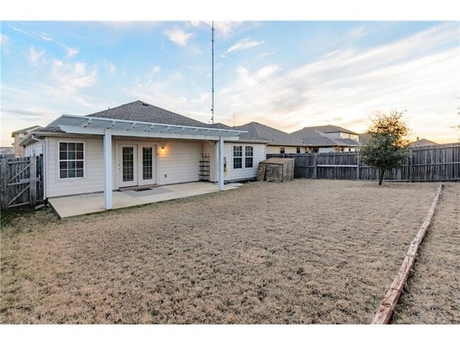 Building Photo - Beautiful single-story home with a front g...