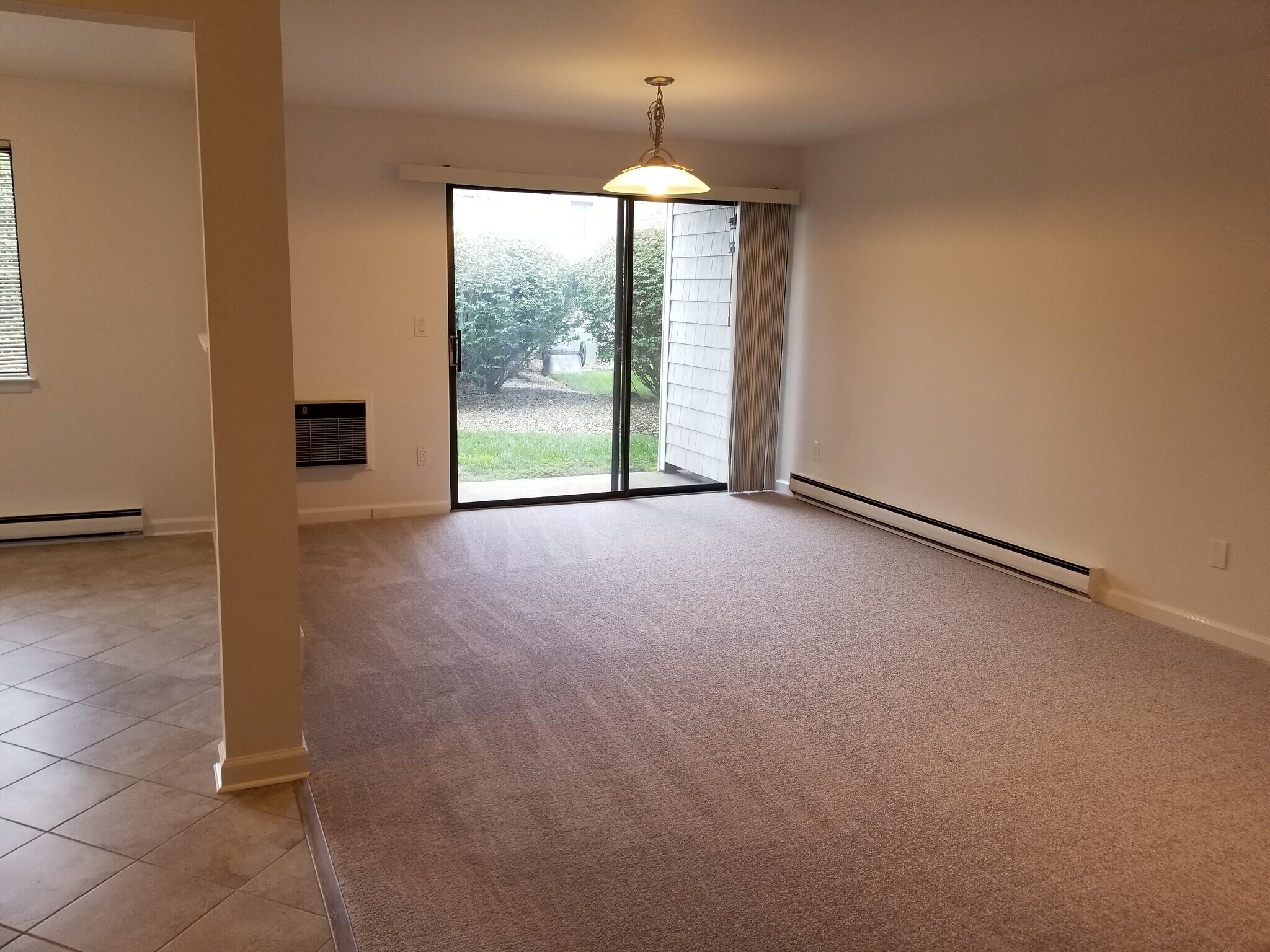 Dining area with sliders to Patio - 199 Gregory Blvd