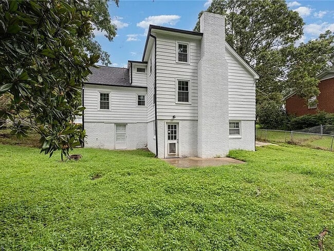Building Photo - Earn Wealth While Leasing - Like a Homeown...