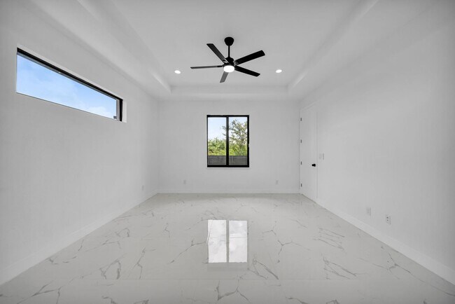 Building Photo - Brand-New Pool Home for Rent – Port Charlo...