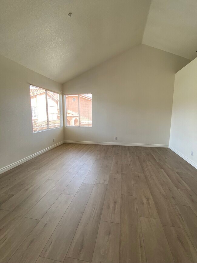 Master Bedroom with brand new paint and flooring - 915 W Arrow Hwy
