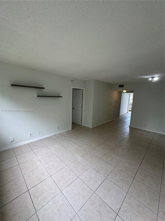 Building Photo - 11213 Royal Palm Blvd