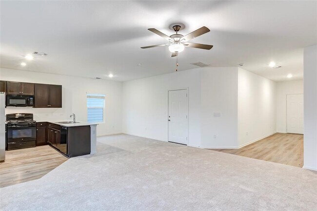 Building Photo - 7706 Poppy Petal Dr