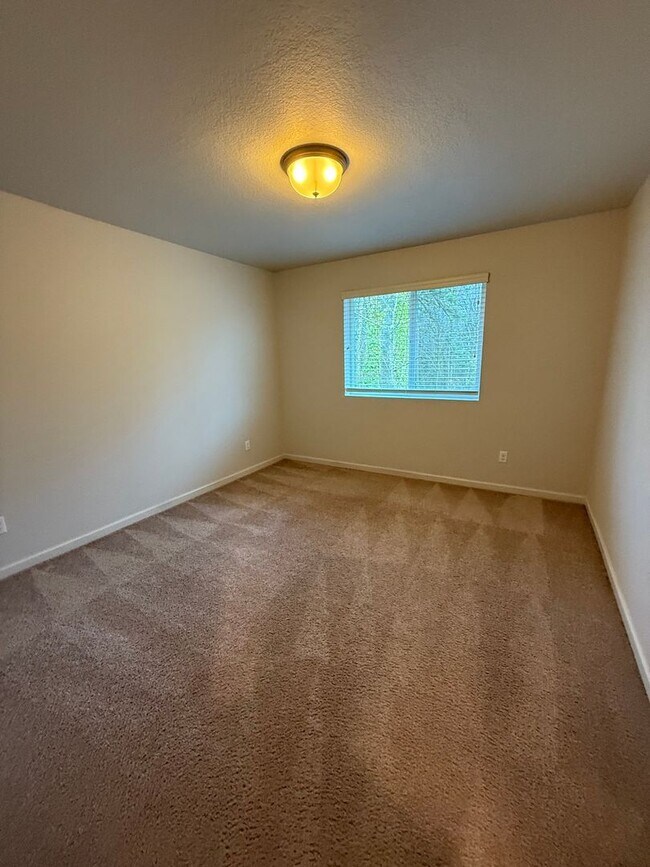 Building Photo - Impressive North Plains Home Backing to Protected Green Space – Move-In Ready!