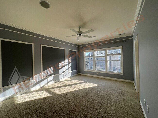 Building Photo - Elegant 3 Story 3 Bedroom Formal Model Tow...