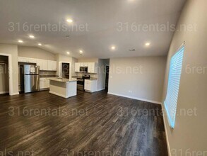 Building Photo - 1809 E 69th Ct N