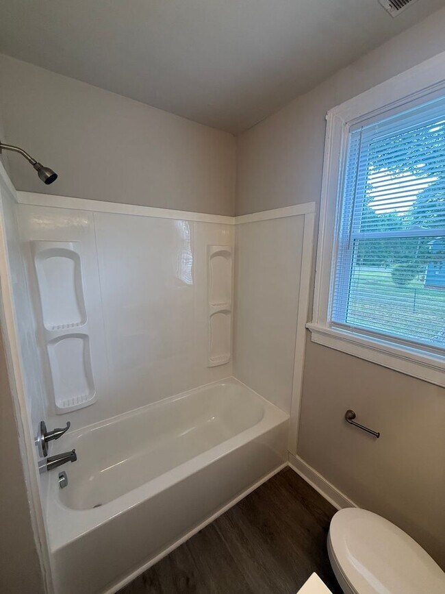 Building Photo - 2-bedroom 1 bathroom Cottage on a large lot with 2 large storage building on site