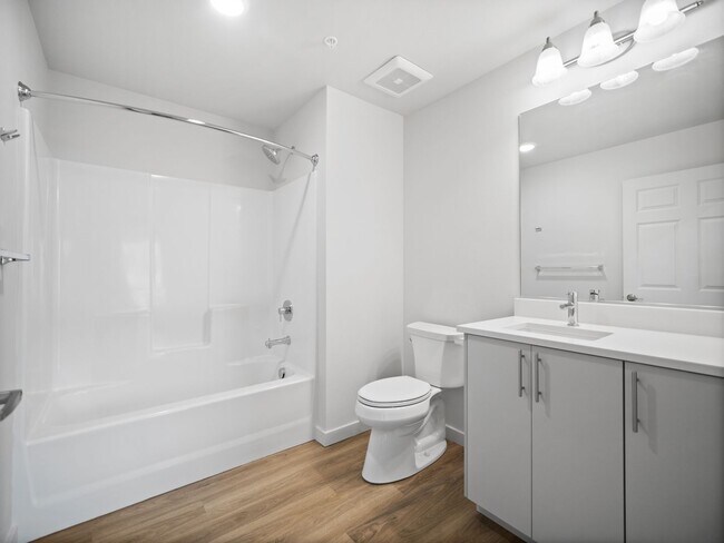 Building Photo - Flats on 4th Apartments