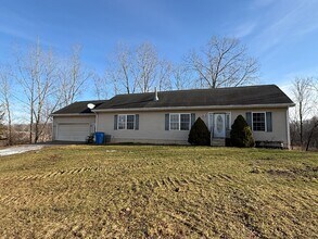 Building Photo - Spacious 3-Bedroom Home with Sunroom and Attached 2-Car Garage in Manchester, MI