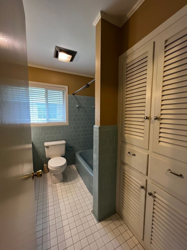 Building Photo - 3 Bedroom, 2 Bathroom, Brick home, Carport...